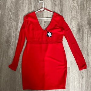 Red revamped dress with sheer sleeves and sheer band on mid section, size Large.